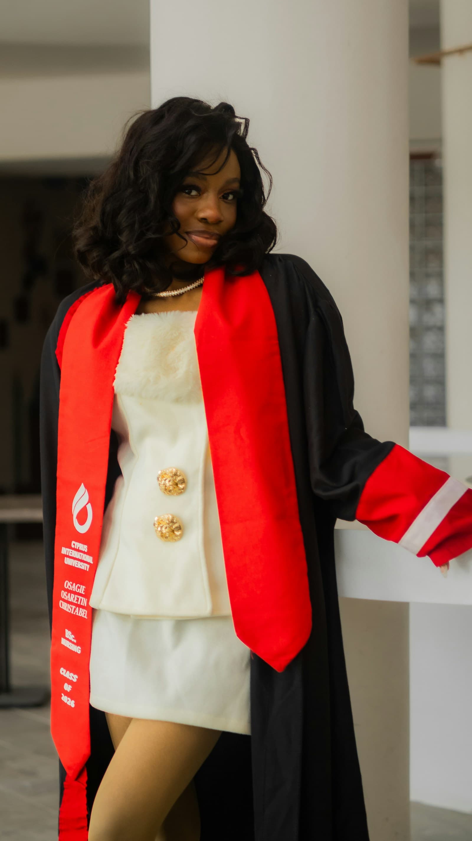 African nursing graduate celebrating her achievement